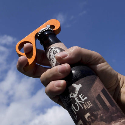 Pop the Cap with a One-Handed Wonder: The Orange GrabOpener!
