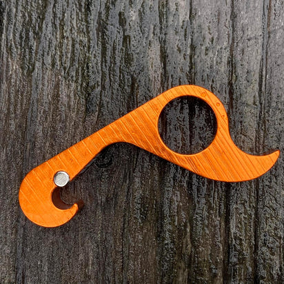 Pop the Cap with a One-Handed Wonder: The Orange GrabOpener!